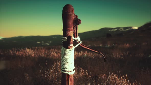 Old Hand Water Pump on Dry Hills