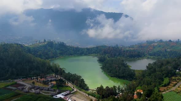 Volcanic Telaga Warna lake in Dieng plateau, Java, Indonesia, aerial panorama