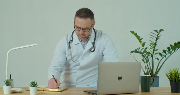 Healthcare Medical Concept. Doctor Writing Prescription Clipboard with Record Information Paper 