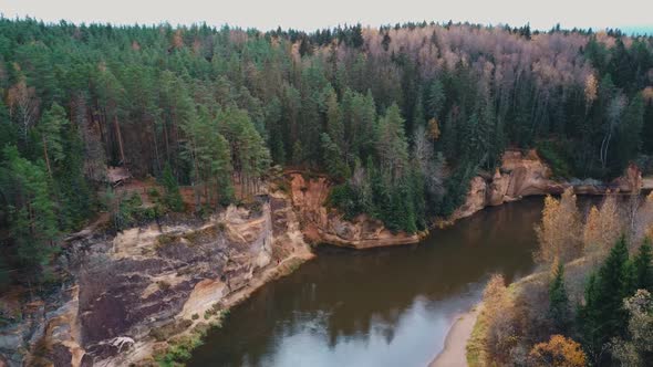 Erglu Cliffs and Great View on the Gauja River Cesis, Latvia. Autumn Landscape Red Rocks Stone Cliff