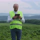 Professional Young Agronomist Uses Digital Technology To Improve Yields - VideoHive Item for Sale