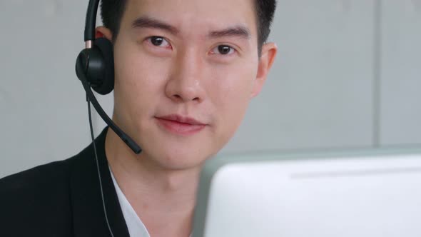 Business People Wearing Headset Working in Office