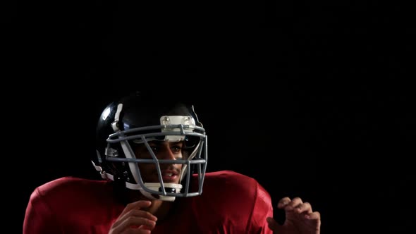 American football player catching the ball 4k