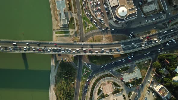 Aerial Top Down View From Drone of Traffic Bridge City with Driving Car