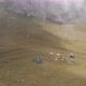 Aerial Shot of a Camp of Climbers in the Mountains Among the Clouds - VideoHive Item for Sale