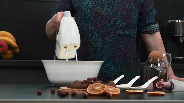 Process of making and whisking dough for cake. 