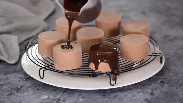 Pastry Chef Pours Mirror Glaze on the Chocolate Mousse Cakes