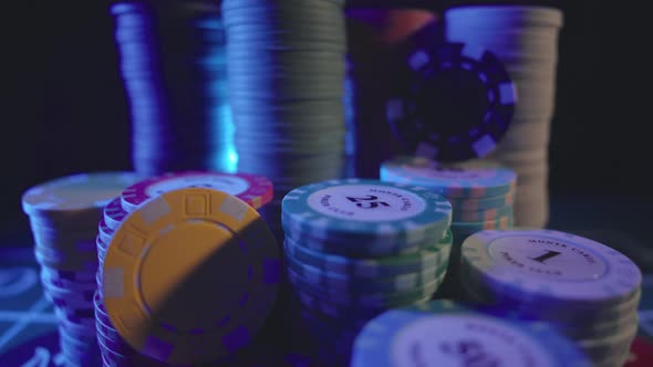 Casino Chips on a Dark Table