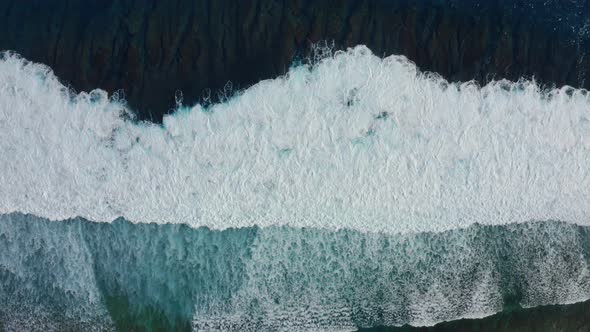 Top View Is a Mesmerizing View of the Ocean Waves Lapping One After the Other