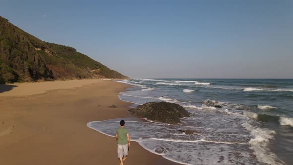 Walking Beach Aerial Drone Shot