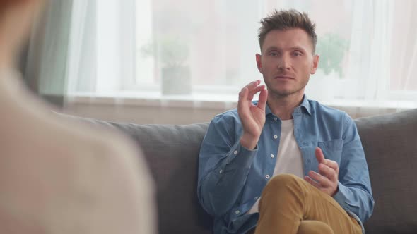 Man Talking on Therapy Session