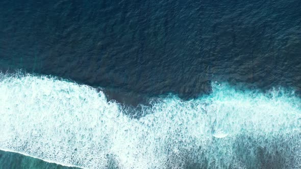 Aerial drone view sky of marine tourist beach vacation by blue sea with bright sandy background of a