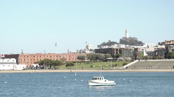 San Francisco cityscape and a boat in the bay