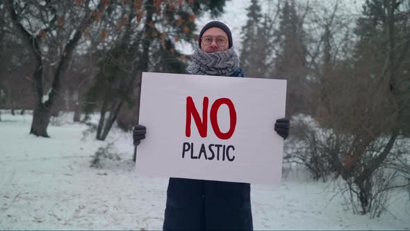 Caucasian Male Protests Against Ocean Pollution With Slogan No Plastic