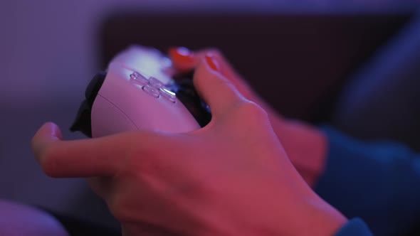 Close Up Shot of Young Woman Playing Game Online at Home