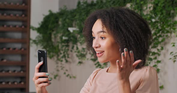 Portrait of Afro American Friendly Girl Black Young Woman Holding Telephone in Hands He Looks at