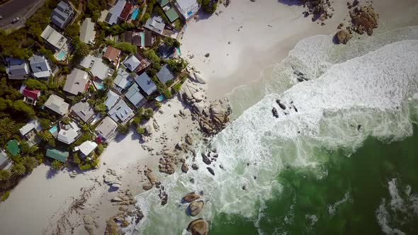 Aerial view of residential beachfront homes in Cape Town, South Africa.