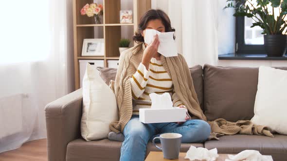 Sick Woman Blowing Nose in Paper Tissue at Home 19