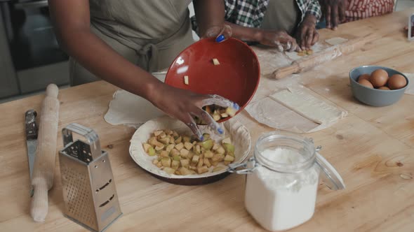 African American Family Making Apple Pie