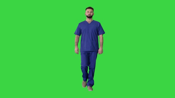 Serious Male Surgeon with a Beard Walking on a Green Screen, Chroma Key