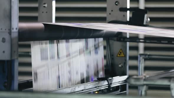 The Printing Process of a Weekly Magazine with Facilities of a Copier Shop