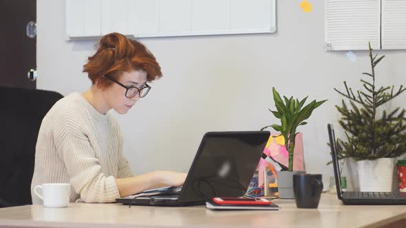 Overtime Concept. Woman Is Working with Computer at Office During Night