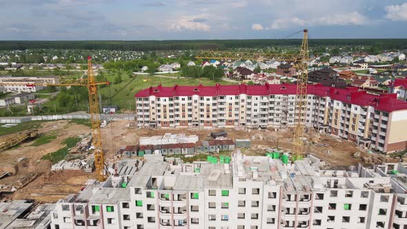 Aerial View of a Modern Apartment Building New Building in the Suburbs