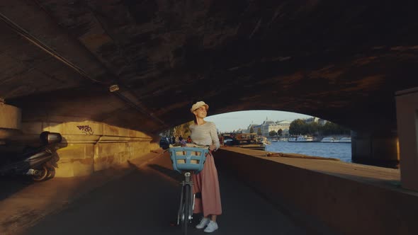 Young girl with a bicycle