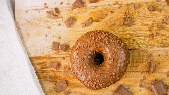 Chocolate Donuts Decorated with Chocolate Pieces