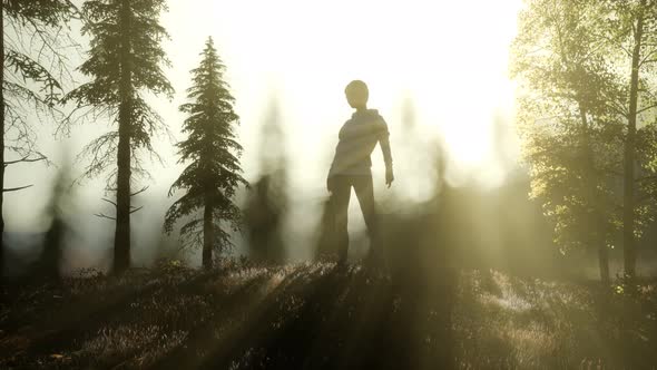 Young Woman Standing Alone Outdoor with Wild Forest Mountains alt