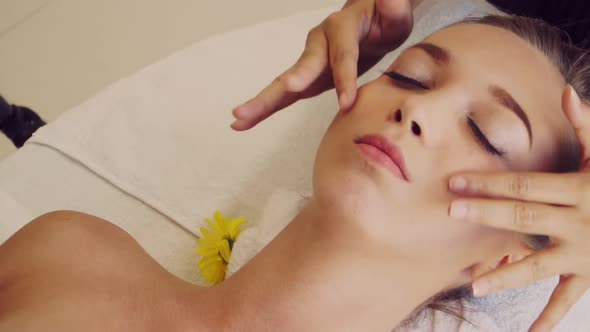 Woman Gets Facial and Head Massage in Luxury Spa