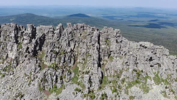 Drone Flight Around Huge Rock at Summer