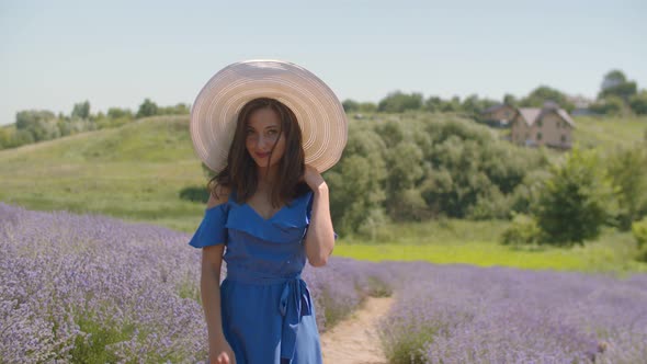 Playful Female Enjoying Nature in Lavender Field