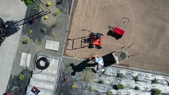 Covering Garden Weed Control Fabric with Small Decorative Rocks