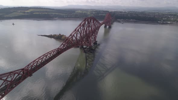 Forth Rail Bridge reveal shoting from left to right.  South facing while camera reveals the bridge a