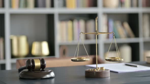 Balance Scale and Gravel on Court Room Table