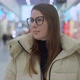 Young Woman Standing and Looking at Camera in Shopping Mall or Trade Center - VideoHive Item for Sale