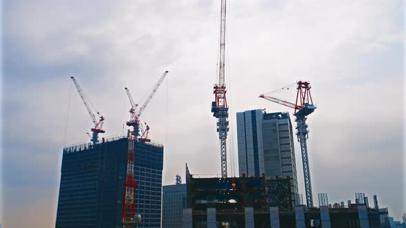 Time lapse architecture crane under construction of building alt
