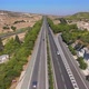 The Car Drives on the Highway Among the Mountains - VideoHive Item for Sale