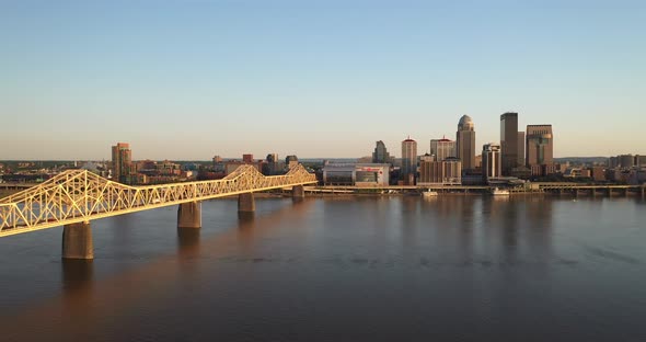 Louisville, Kentucky skyline with bridge with drone video moving in.