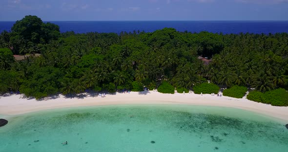 Beautiful overhead island view of a paradise sunny white sand beach and blue water background in hi 