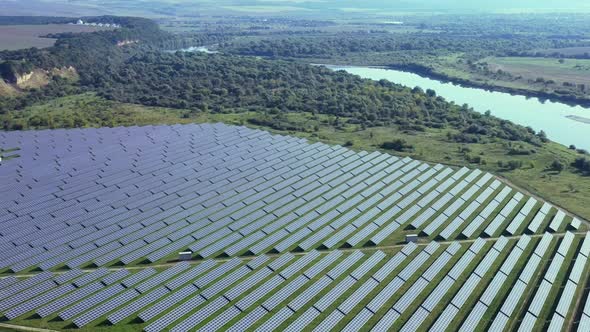 aerial view of solar power station, Aerial Top View of Solar Farm with Sunlight, Renewable Energy