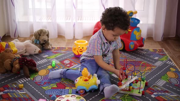 Boy Playing With Toys