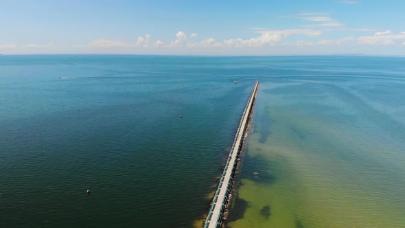 Aerial rising views of Caseville Pier on Lake Huron in Michigan, USA