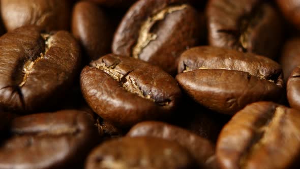 Roasted Coffee Beans on a Table. Rotating. Close Up