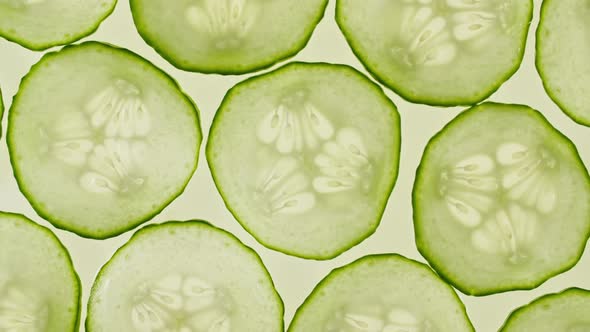 Macro Shot of Transparent Slice of Cucumber Fruit and Rotate