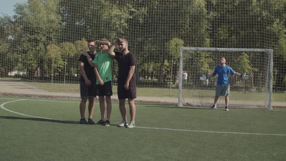 Defending Team Forming a Wall To Block Free Kick