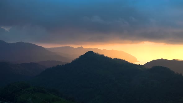 Mystical Emotional Sunrise in Forested Hills to Sea