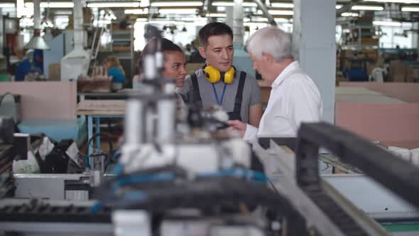 Workers Talking with Factory Manager