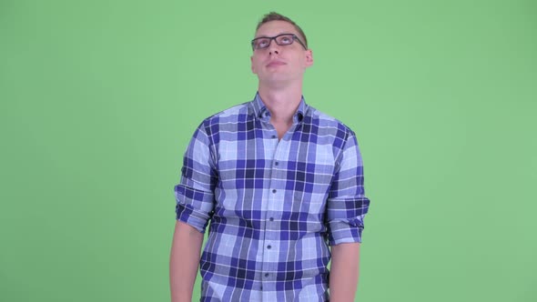 Stressed Young Hipster Man Looking Bored and Tired